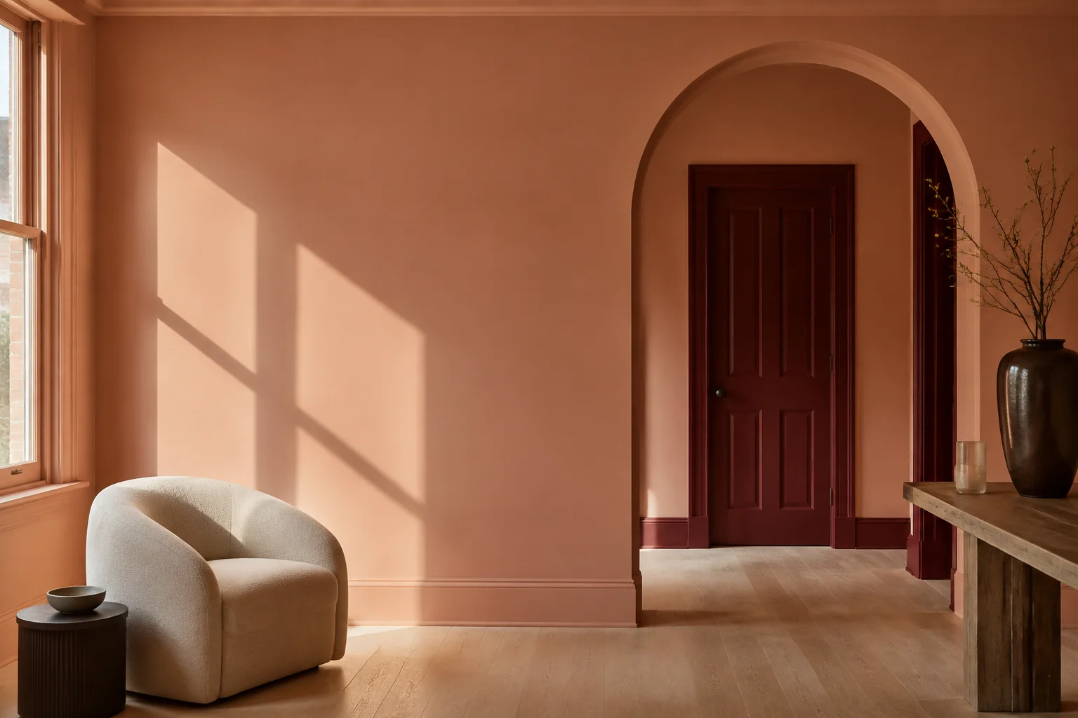 Generated concept of a coral painted living room, curved doorway and deep red timber door