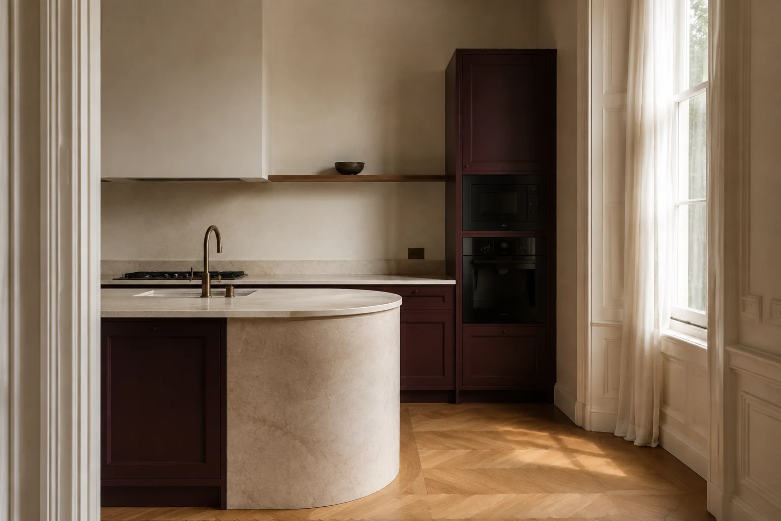 Concept detail of a limestone island and rich aubergine kitchen cabinetry