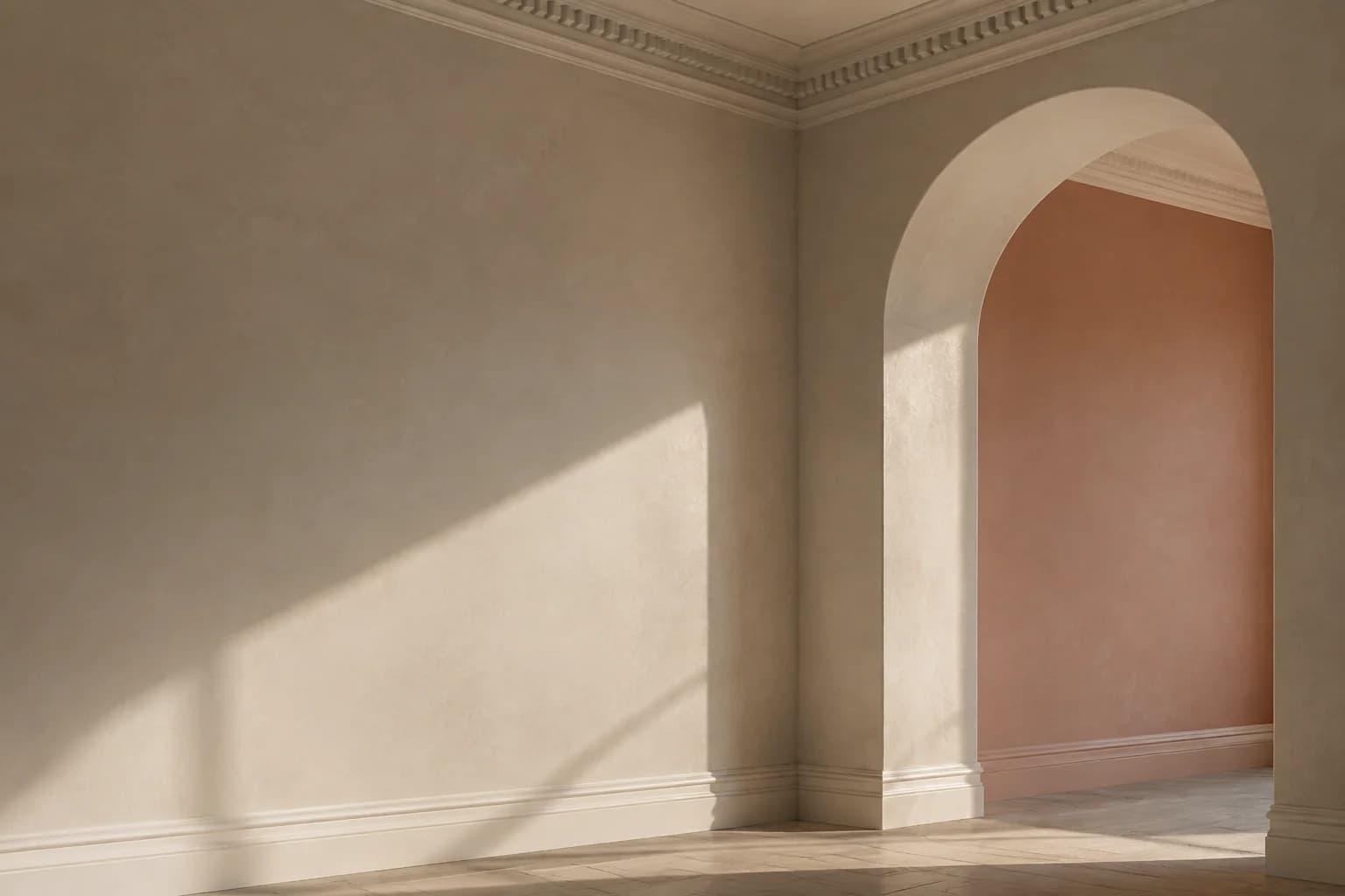 Concept hand-finished plaster wall and arched doorway with careful cornice and skirting details